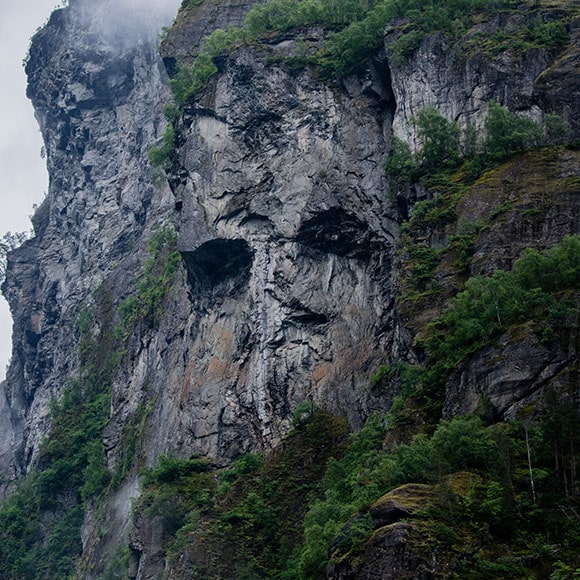 Face in mountain pattern